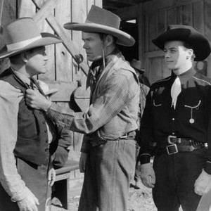 WESTERN TRAILS, from left: Jack Rockwell, John Ridgely, Bob Baker, 1938