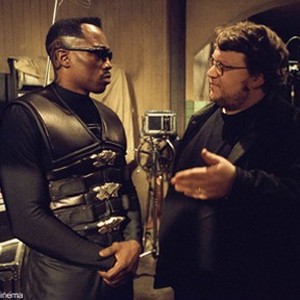 Wesley Snipes (left) and Director Guillermo del toro discussing a scene on the set of New Line Cinema's action thriller, BLADE II.