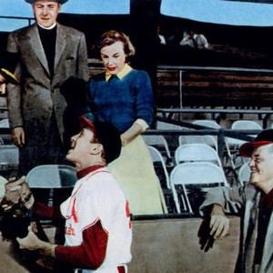 STRATEGIC AIR COMMAND, Bruce Bennett (left), James Stewart (baseball uniform), James Bell (priest), June Allyson, Jay C. Flippen (baseball cap), 1955