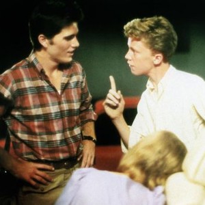 SIXTEEN CANDLES, standing from left: Michael Schoeffling, Anthony Michael Hall, Haviland Morris (back to camera), 1984, © Universal