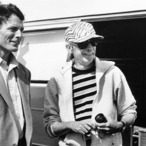 VILLAGE OF THE DAMNED, from left: Christopher Reeve, director John Carpenter, on set, 1995. ©Universal Pictures
