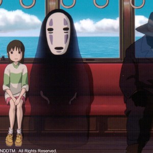 Chihiro and a transparent spirit named "No-Face" travel by train to tát the trang chủ of Yubaba's more compassionate twin sister sorceress, Zeniba.