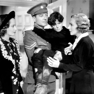 BELOVED ENEMY, Merle Oberon, Ronald Sinclair (second right), Karen Morley, 1936