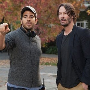 KNOCK KNOCK, from left: director Eli Roth, Keanu Reeves, on set, 2014./©Lionsgate Premiere