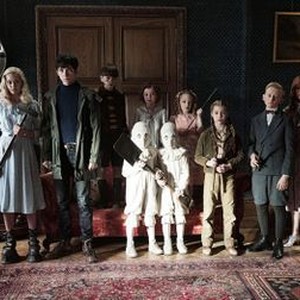 MISS PEREGRINE'S HOME FOR PECULIAR CHILDREN, l-r: Finlay Macmillan, Ella Purnell, Asa Butterfield, Milo Parker, Thomas Odwell, Pixie Davies, Joseph Odwell, Raffiella Chapman, Georgia Pemberton, Hayden Keeler-Stone, Lauren McCrostie, C. King, 2016. ph: Jay Maidment/TM & copyright © 20th Century Fox Film Corp. All rights reserved