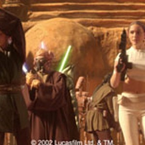 Anakin Skywalker (Hayden Christensen) and Padmé Amidala (Natalie Portman) form a defensive circle with other Jedi as battle droids and super battle droids move in for the kill in the Geonosis arena. photo 7