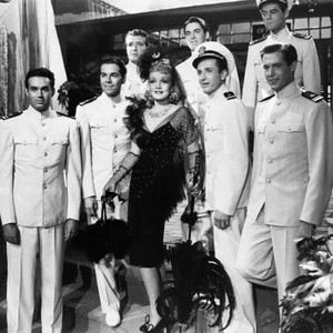 SEVEN SINNERS, front: Marlene Dietrich (center), William Bakewell (captain's cap), 1940