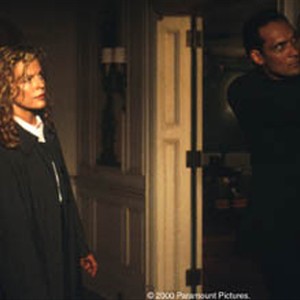 (L-R) Kim Basinger as Maggie O'Connor and Jimmy Smits as Agent John Travis in "Bless the Child." photo 9