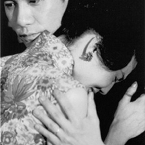 Mo-wan comforts Li-zhen in the Wong Kar-Wai film In the Mood for Love. photo 18