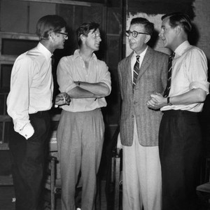 HAPPY IS THE BRIDE, producer Dore Schary, (third from left), with John Boulting, director Roy Boulting, Ian Carmichael, 1957