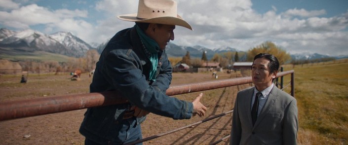 Javier, a ranch hand (Goya Robles, L), introduces himself to Hideki (Arata Iura), in "Tokyo Cowboy." (Salaryman Films LLC)