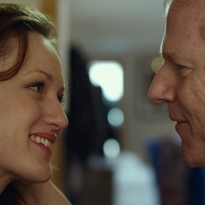 Kerry Bishé as Sharon and Noah Emmerich as FX in "The Fitzgerald Family Christmas." photo 1