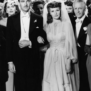 COVER GIRL, foreground from left: Jinx Falkenburg (flowers in hair), Lee Bowman (tuxedo), Rita Hayworth (veil), Otto Kruger (white hair), 1944 covergirl1944rh-fsct02, Photo by:  (covergirl1944rh-fsct02)