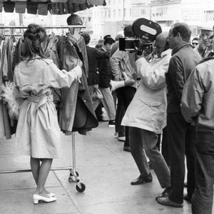 PETULIA, Julie Christie (left), director Richard Lester (behind camera), on location, San Francisco, California, 1968