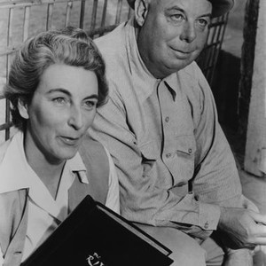 THE RIVER, from left: novelist and screenwriter Rumer Godden, director Jean Renoir on set, 1951