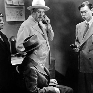 DARK ALIBI, standing from left: Mantan Moreland, Sidney Toler, Benson Fong, 1946