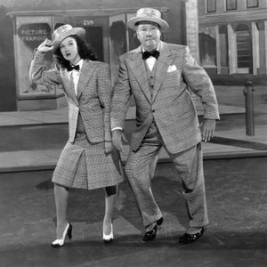 ON STAGE EVERYBODY, from left, Peggy Ryan, Jack Oakie, 1945