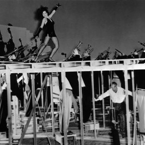 SMALL TOWN GIRL, Ann Miller, (top), choreographer Busby Berkeley, (bottom), filming the 'I Gotta Hear that Beat' number, 1953