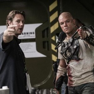 ELYSIUM, from left: director Neill Blomkamp, Matt Damon, on set, ph: Kimberley French/©Sony Pictures