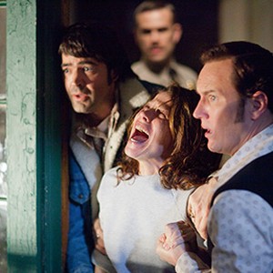 (L-R) Ron Livingston as Roger Perron, Lili Taylor as Carolyn Perron and Patrick Wilson as Ed Warren in "The Conjuring."