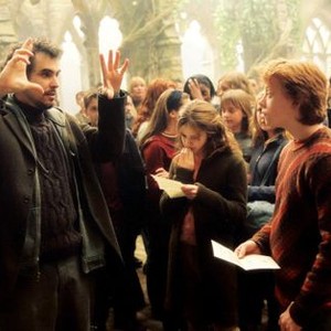 HARRY POTTER AND THE PRISONER OF AZKABAN, director Alfonso Cuaron, Emma Watson, Rupert Grint, Matthew Lewis on set, 2004, © Warner Brothers