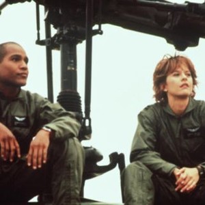 COURAGE UNDER FIRE,  TM and Copyright (c) 20th Century Fox Film Corp. All rights reserved. Seth Gilliam, Meg Ryan, 1996, sitting on helicopter