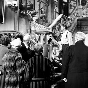 BALL OF FIRE, on stairs from left: Barbara Stanwyck, Gary Cooper; foreground from left: Leonid Kinskey, Richard Haydn (nightcap), Oscar Homolka (dark hair), Aubrey Mather (bald), Henry Travers, S.Z. Sakall, 1941