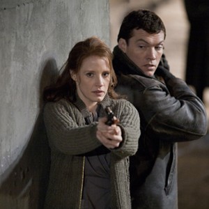 Jessica Chastain as Rachel Singer and Sam Worthington as David in "The Debt."