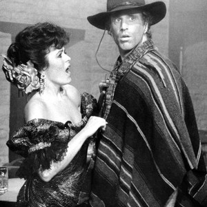 A FINE MESS, from left, Maria Conchita Alonso, Ted Danson, 1986, ©Columbia Pictures