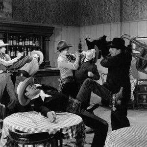 THE WHISPERING SKULL, first, third, fourth, fifth and sixth from left: Guy Wilkerson, Dave O'Brien, Tex Ritter, Frank Ellis, I Stanford Jolley, 1944