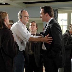 DEATH AT A FUNERAL, center: Keeley Hawes (back to camera), director Frank Oz, Andy Nyman, Matthew Macfadyen, on set, 2007. ©MGM