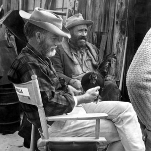 BALLAD OF CABLE HOGUE, Sam Peckinpah (with rooster) and Jason Robards on-SET, 1970