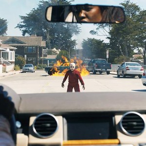 US, EVAN ALEX AS DOPPELGANGER PLUTO (IN FRONT OF CAR), 2019. © UNIVERSAL