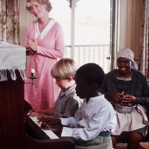 THE POWER OF ONE, Tracy Brooks Swope (standing), at piano from left: Guy Witcher, Tonderai Masenda, Nomadlozi Kubheka (right), 1992, © Warner Brothers