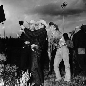 THE BIG SKY, from left, cameraman Russell Harlan, director Howard Hawks, Kirk Douglas, on location in Wyoming, 1951