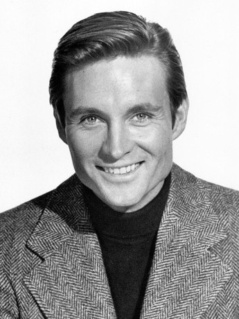 black and white photo of a surprisingly non-wooden smile 