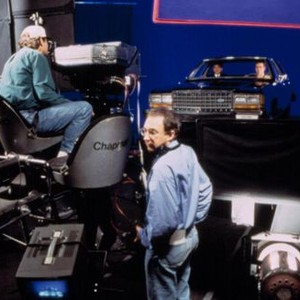 MEN IN BLACK, Director Barry Sonnenfeld preparing to shoot a blue screen shot with Will Smith, Tommy Lee Jones on-set, 1997