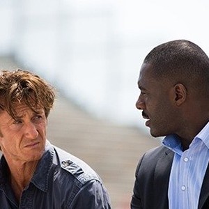 (L-R) Sean Penn as Jim Terrier and Idris Elba as DuPont in "The Gunman." photo 2