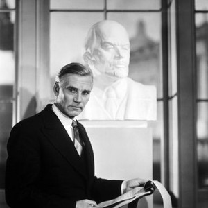 MISSION TO MOSCOW, Walter Huston in front of bust of Nikolai Lenin, 1943