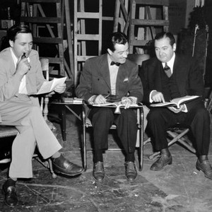 JOHNNY EAGER, from left, director Meryn LeRoy, Robert Taylor, Edward Arnold, on-set, October 1941