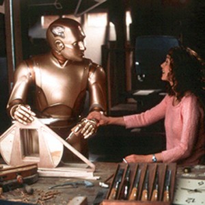 Robot Andrew (Robin Williams) and the adult Little Miss (Embeth Davidtz) photo 16