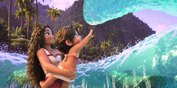 Moana (voiced by Auli’i Cravalho, L) demonstrates her supernormal abilities to tame the ocean to her little sister Simea (voiced by Khaleesi Lambert-Tsuda), in "Moana 2." (Walt Disney Animation Studios)