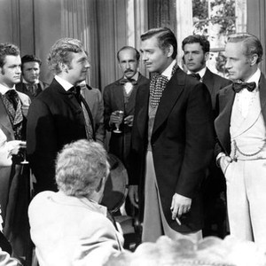 GONE WITH THE WIND, standing center second, third and fourth from left: Rand Brooks, Clark Gable, Leslie Howard, 1939