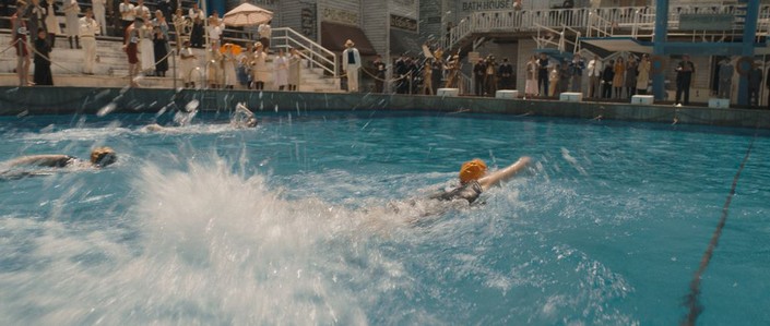 Trudy Ederle (Daisy Ridley, R, in pool) takes swimming lessons, in "Young Woman and the Sea." (Walt Disney Studios)