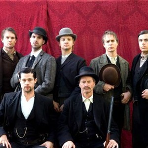 THE ASSASSINATION OF JESSE JAMES BY THE COWARD ROBERT FORD, back row: Garret Dillahunt, Paul Schneider, Jeremy Renner, Sam Rockwell, Casey Affleck as Robert Ford, front row: Brad Pitt as Jesse James, Sam Shepard, 2007. ©Warner Bros.