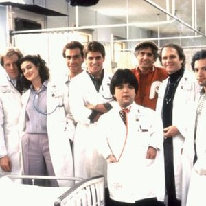 YOUNG DOCTORS IN LOVE, Rick Overton, Michael McKean, Sean Young, Taylor Negron, Ted McGinley, Gary Friedkin, director Garry Marshall, Patrick Collins, Kyle T. Heffner on set, 1982, TM & Copyright (c) 20th Century Fox Film Corp.