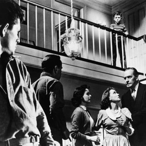 THE DESPERATE HOURS, from left: Dewey Martin, Humphrey Bogart, Mary Murphy, Martha Scott, Fredric March, Richard Eyer (top), 1955