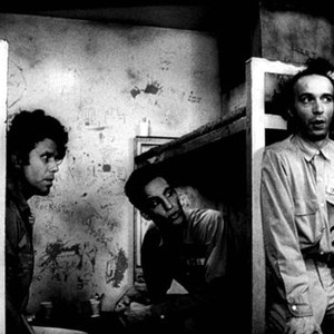 DOWN BY LAW, Tom Waits, John Lurie, Roberto Benigni, 1986, sitting in prison cell