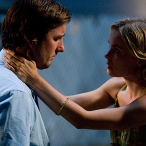 (Left to right.) Luke Wilson and Radha Mitchell star in Overture Films' HENRY POOLE IS HERE. photo 6