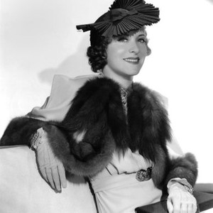 THE BIG BROADCAST OF 1937, Gracie Allen, in sable-trimmed suit and fluted faille hat by Travis Banton, 1936
